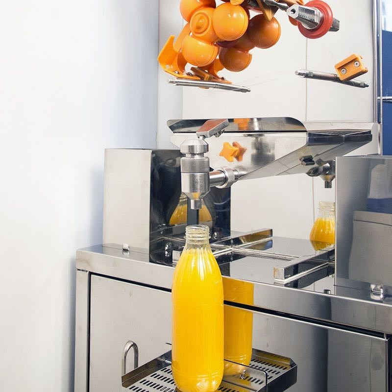Presse orange automatique spécial service de bouteilles de jus